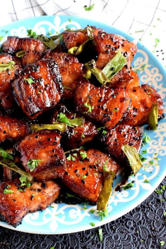 An indulgent dish that takes hold of your senses and doesn't apologize - Easy Baked Pork Belly is slightly spicy with hints of saltiness and sweetness; it's super moist and super delicious! #pork #belly #baked #porkbelly #theotherwhitemeat #asiancooking