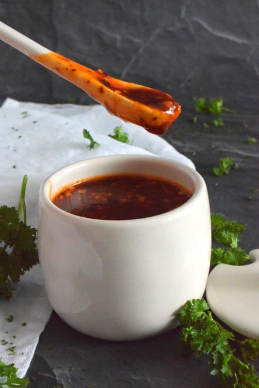 This hot and spicy sauce only has a scary name like Dragon Fire Sauce; it most certainly isn't blow-your-head-off hot - not in small amounts anyway! This sauce has so many uses and tastes great on so many things! #dragonfire #hotsauce #gochujang #hotandspicy #chilies