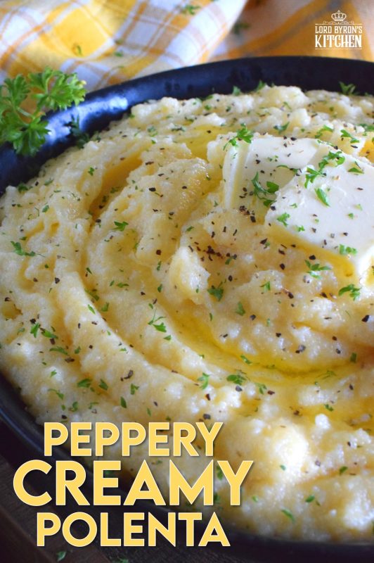 In colder months, one craves food that is heavier and heartier. Peppery Creamy Polenta is certainly that type of food. It is warming and comforting, and prepared with lots of fresh ground black pepper, butter, and cheese. A perfect winter side, especially when served with beef! #polenta #grits #creamy #cornmeal #sides #vegetarian #sidedishes