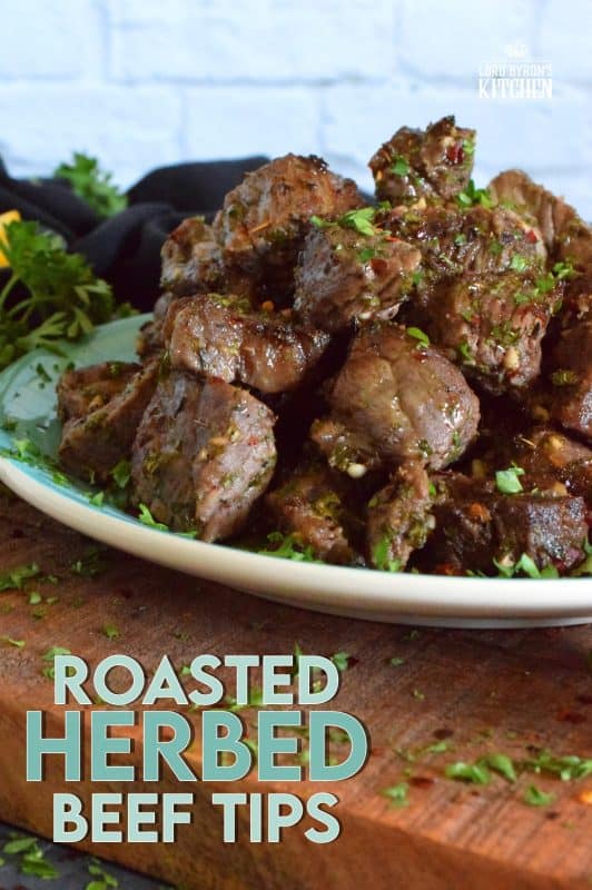 A simple marinade, a little patience, and a very hot oven are all you need to prepare these Roasted Herbed Beef Tips. Use a good cut of beef for the most tender bites! Can be marinated for up to 12 hours and takes just 20 minutes to roast, so this is a great option for a weeknight family dinner! #beef #tips #herbed #sirloin #roasted #baked #tender #marinade