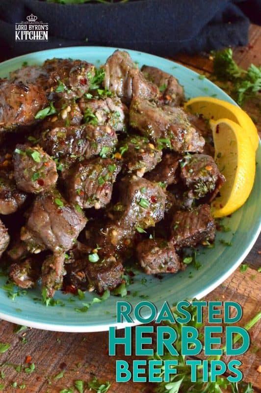 A simple marinade, a little patience, and a very hot oven are all you need to prepare these Roasted Herbed Beef Tips. Use a good cut of beef for the most tender bites! Can be marinated for up to 12 hours and takes just 20 minutes to roast, so this is a great option for a weeknight family dinner! #beef #tips #herbed #sirloin #roasted #baked #tender #marinade