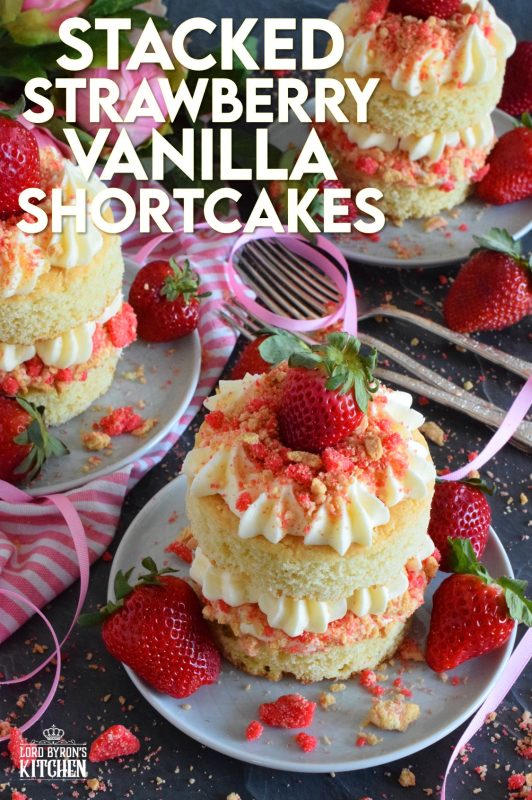 These gorgeous mini individual-sized cakes are super easy to make and look quite impressive. Stacked Vanilla Strawberry Shortcakes are prepared with vanilla sheet cake, strawberry shortcake crumbs, buttercream frosting, and fresh strawberries. You're going to love these shortcakes! #strawberry #strawberryshortcake #cake #stackedcake #layeredcake #valentines