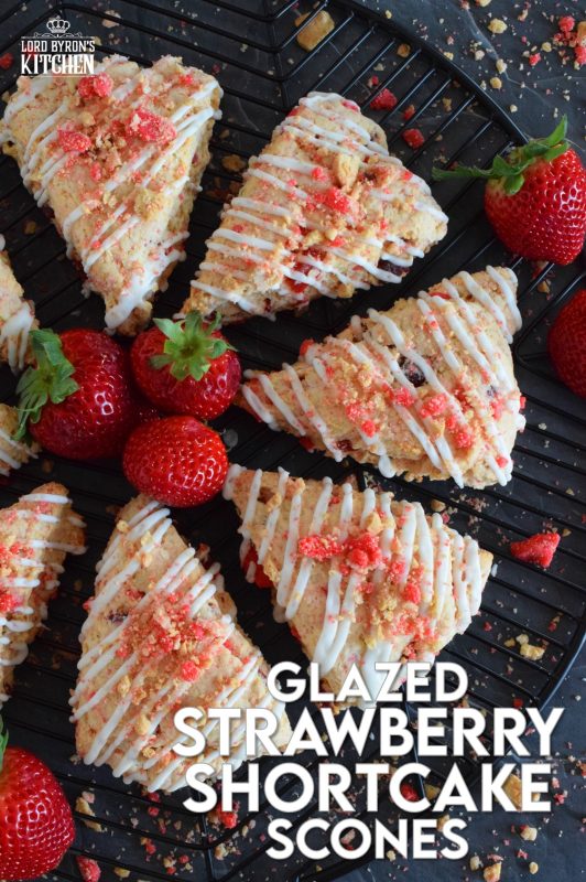 Glazed Strawberry Shortcake Scones have triple the strawberry flavour for the absolute most strawberry-esque scone ever! Packed with real strawberries, strawberry shortcake crumble, and strawberry extract, these are a tasty and delightful sweet treat! #strawberry #shortcake #strawberryshortcake #scones #dried #fresh