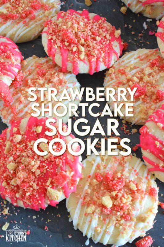 The uncomplicated and delicious sugar cookie gets a fresh, new flavour profile, and an upgrade in this Strawberry Shortcake Sugar Cookies recipe. A classic sugar cookie base is topped with a simple glaze and sprinkled with homemade shortcake crumbs. These would make a great giftable dessert idea for Valentine's Day! #strawberry #shortcake #sugarcookies #cookies #strawberryshortcake #valentine