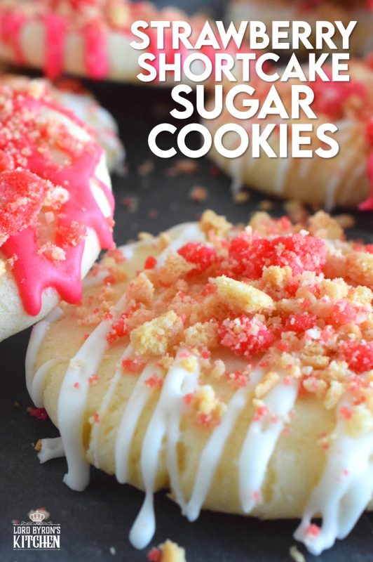 The uncomplicated and delicious sugar cookie gets a fresh, new flavour profile, and an upgrade in this Strawberry Shortcake Sugar Cookies recipe. A classic sugar cookie base is topped with a simple glaze and sprinkled with homemade shortcake crumbs. These would make a great giftable dessert idea for Valentine's Day! #strawberry #shortcake #sugarcookies #cookies #strawberryshortcake #valentine