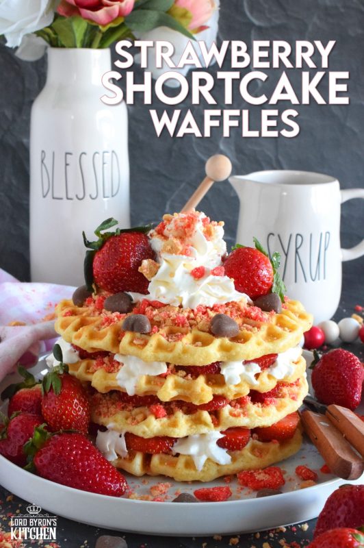 Light and airy Strawberry Shortcake Waffles make a perfect weekend brunch item! Prepared with delicious homemade waffles and layered with whipped cream, sliced fresh strawberries, strawberry shortcake crumbs, and syrup, this is one scrumptiously impressive and flavourful treat! #waffles #strawberries #strawberry #shortcake #strawberryshortcake #brunch #stacked