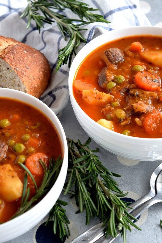 Substituting stewing beef with chunky mushrooms is a great way to make Vegetarian Beefless Stew. Use hearty mushrooms, like creminis, for best results. It's so delicious and so hearty, everyone will love it - even the meat lover in your family! #vegetarian #beefless #meatless #beef #stew #soup