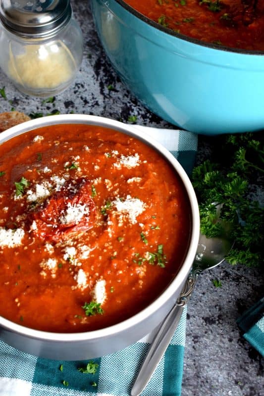 Roasting vegetables intensifies flavour and brings out their natural sweetness. The charred bits will add smokiness and a homestyle flair. It's certainly evident in this Roasted Red Pepper and Tomato Soup! This delicious soup is super thick and hearty; and easy to prepare too! #roasted #redpepper #bellpepper #soup