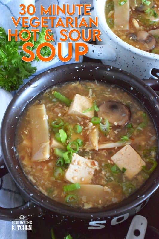 Prepared with mushrooms, bamboo shoots, tofu, and green onions, this 30 Minute Vegetarian Hot and Sour Soup is all you need to keep warm this winter. A popular Chinese buffet starter that everyone loves, this soup is thick and loaded with good-for-you ingredients. #hotandsour #soup #copycat #takeout #tofu