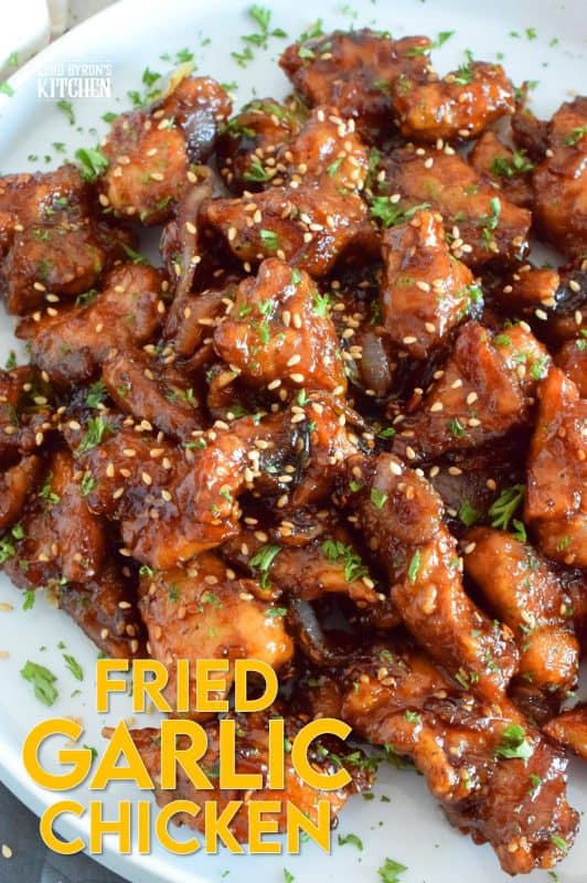 Fried Garlic Chicken is a crispy fried chicken in a thick and savoury garlic sauce; this dish is most certainly for the garlic lover. Prepared with a unique battering technique, and double fried, this chicken is sweet and super garlicky - it's made with twelve cloves of garlic! #garliclovers #garlicky #friedchicken #chicken #thighs
