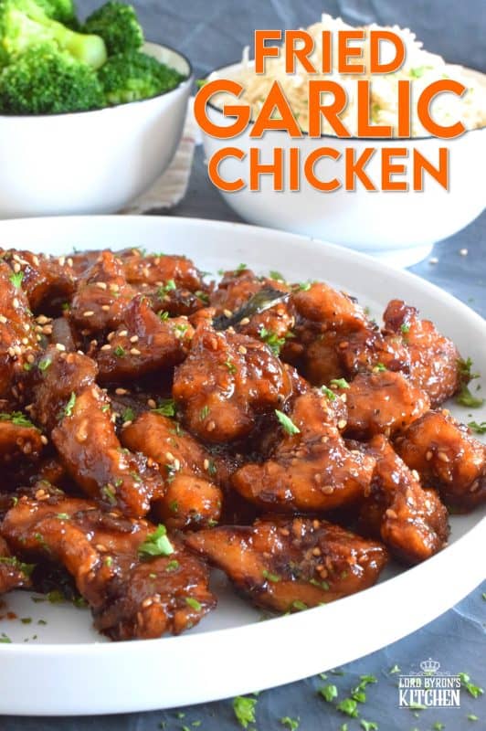 Fried Garlic Chicken is a crispy fried chicken in a thick and savoury garlic sauce; this dish is most certainly for the garlic lover. Prepared with a unique battering technique, and double fried, this chicken is sweet and super garlicky - it's made with twelve cloves of garlic! #garliclovers #garlicky #friedchicken #chicken #thighs
