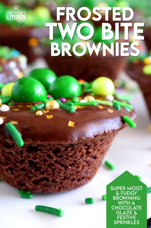 Frosted Two Bite Brownies are for the serious chocolate lover! Dense and moist brownies frosted with the easiest chocolate frosting you'll ever make and topped with sprinkles; you can't eat just one!! #twobite #brownies #frosted #twobitebrownies #stpatricksdayrecipes #greenfood
