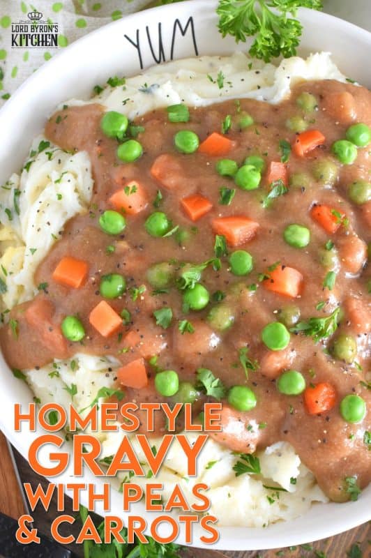 Thick or thin, the choice is yours, but when it comes to Homestyle Gravy with Peas and Carrots, I think thick is best! This easy to make from scratch gravy is deliciously savoury and a perfect vessel to suspend those buttered carrots and peas into! Pour liberally over mashed potatoes and dig in! #gravy #vegetarian #stpattysday #mashedpotatoes