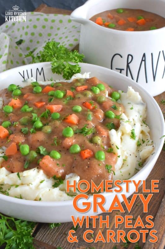 Thick or thin, the choice is yours, but when it comes to Homestyle Gravy with Peas and Carrots, I think thick is best! This easy to make from scratch gravy is deliciously savoury and a perfect vessel to suspend those buttered carrots and peas into! Pour liberally over mashed potatoes and dig in! #gravy #vegetarian #stpattysday #mashedpotatoes