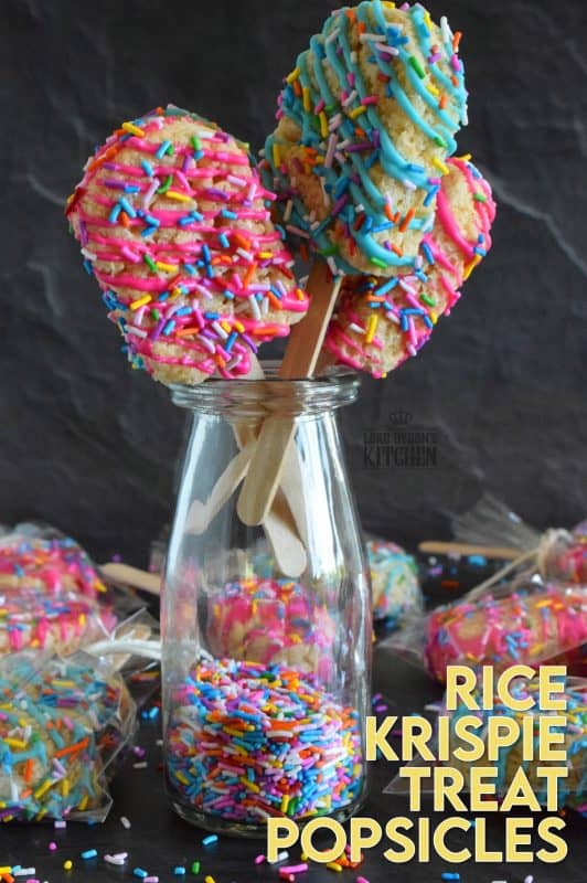 These cute little treats are so easy to make and just in time for Easter! Rice Krispie Treat Popsicles are a no-bake treat with so many decorating options! Choose your base, choose your drizzle colours, and choose your sprinkles. Perfect for kids, but great for adults who like to play with their food too! #ricekrispietreat #ricekrispies #popsicles #nobake #eastertreats #easter