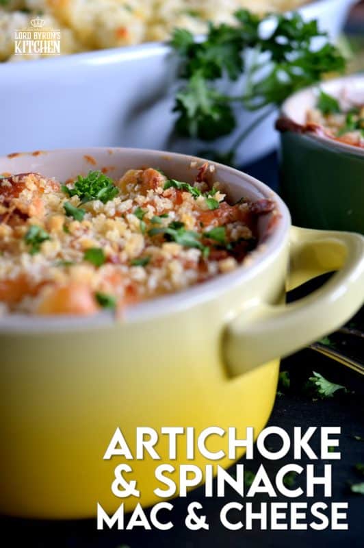 There's nothing wrong with regular mac and cheese, but it simply cannot compare to this Ultimate Spinach and Artichoke Mac and Cheese! It is the cheesiest and the creamiest, with a crispy, crunchy crumb topping. Make no mistake, this cannot be found in a box at the grocer! #spinach #macandcheese #artichoke