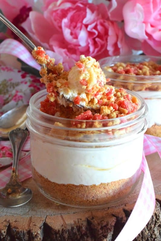 Remember those pink and white ice cream bars with the crumb coating? If you loved those, then you're already a fan of Shelby's Strawberry Shortcake. Prepared in a jar or as a pie, this is a simple-to-prepare dessert that will have your guests begging for more! #strawberry #shortcake #creamcheese #crumbs