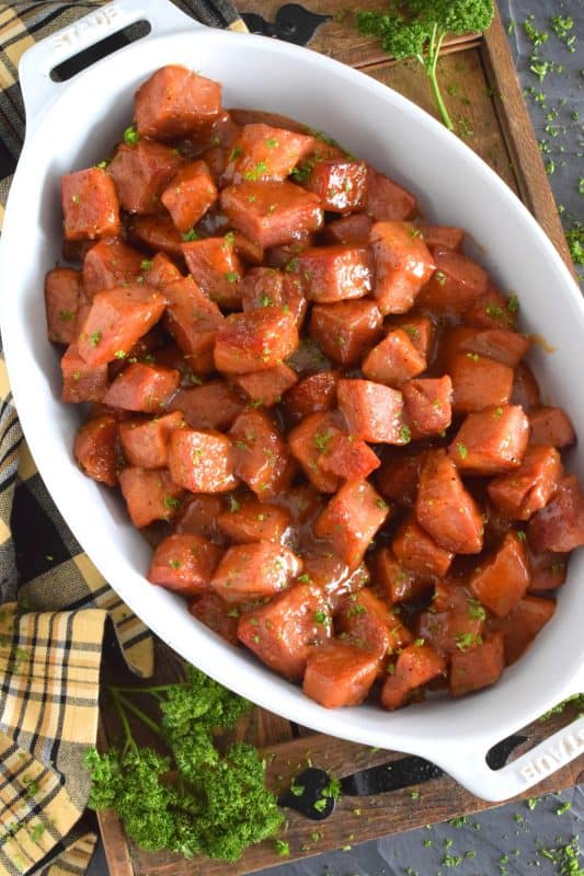 This boneless glazed ham is super easy to prepare and everyone loves it! The ham is tender and moist; it is salty, sweet and a little tart too, which makes it the perfect Easter main! Serve this retro-inspired dish the easy way - no need for carving and fancy presentation. Pineapple Glazed Ham has all the flavour without all the fuss! #pineapple #glazed #ham #easterham #glazedham #countryham #virginia