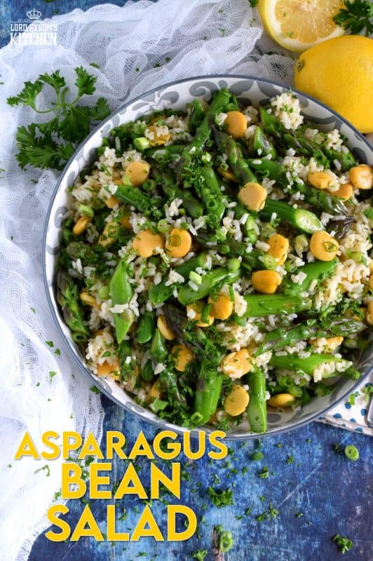 A delicious side salad, yet hearty enough to be a complete meal. Made with asparagus and canned beans, this dish is great served cold or at room temperature! #asparagus #lupini #bean #rice #salad #summer #picnic #backyard