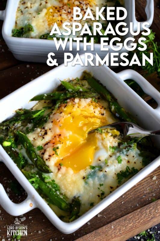 Simple, hearty, and delicious; individual portions make these Baked Asparagus with Eggs and Parmesan easy to serve and a little elegant too! This is exactly how I serve asparagus as a main! Dip some crusty bread in the soft yolks - it's scrumptious!! #baked #asparagus #egg #parmesan #brunch