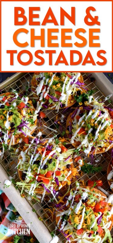Bean and Cheese Tostadas are piled high with fresh veggies and topped with guacamole and sour cream. They're like an unrolled burrito with the crunch of a taco. Try eating just one! #tostadas #Mexican #recipes #vegetarian