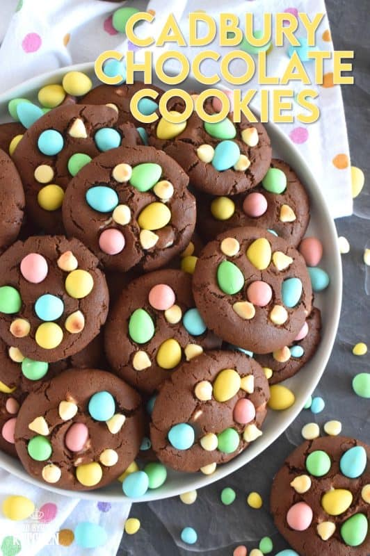Cadbury Chocolate Cookies are slightly crispy on the outside, with a moist and dense chocolaty center. Stuffed with white chocolate chips and topped with chocolate mini eggs, these are substantial cookies, meaning that they are thick and filling. Great for dunking in a glass of cold milk too! #cadbury #minieggs #easter #cookies #chocolate
