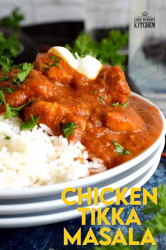 Tender chicken breast pieces, marinated in yogurt and spices, and simmered in a thick, luscious curry sauce. Why go out for Indian food when you can make Chicken Tikka Masala at home? Going out is so last year, anyway! #chicken #tikkamasala #indianchicken #indianathome #marinade #indianfood #indianrecipes