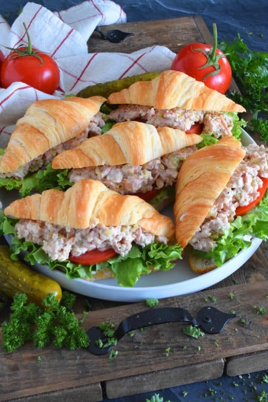 There's a time for the ease of store-bought thinly sliced deli meat, and then there's a time for a homemade deviled ham salad piled high onto fresh croissants with crisp, leafy lettuce, and thick slices of the brightest and freshest red tomatoes. So, do you want fast and easy, or do you want fast, easy, fresh, and delicious? #deviled #ham #croissant #hamsandwich #deviledham