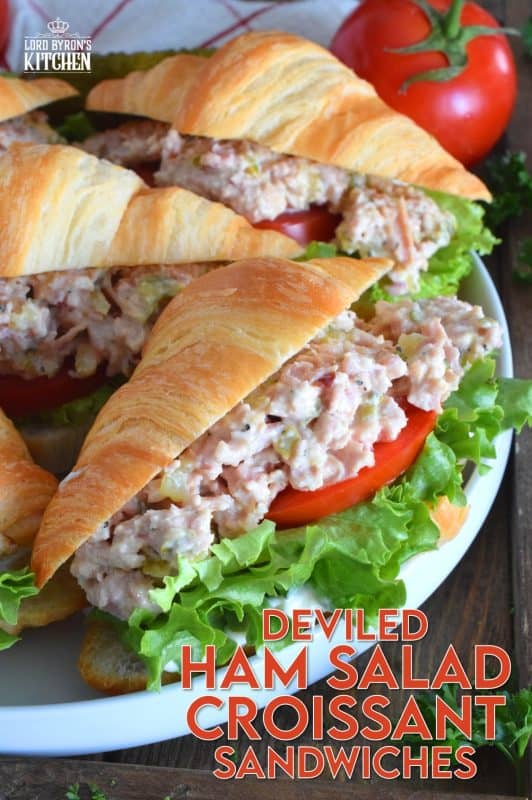 There's a time for the ease of store-bought thinly sliced deli meat, and then there's a time for a homemade deviled ham salad piled high onto fresh croissants with crisp, leafy lettuce, and thick slices of the brightest and freshest red tomatoes. So, do you want fast and easy, or do you want fast, easy, fresh, and delicious? #deviled #ham #croissant #hamsandwich #deviledham