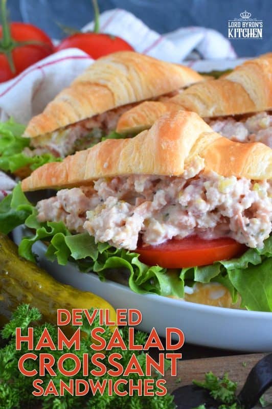 There's a time for the ease of store-bought thinly sliced deli meat, and then there's a time for a homemade deviled ham salad piled high onto fresh croissants with crisp, leafy lettuce, and thick slices of the brightest and freshest red tomatoes. So, do you want fast and easy, or do you want fast, easy, fresh, and delicious? #deviled #ham #croissant #hamsandwich #deviledham