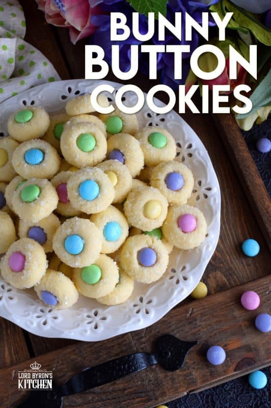 Miniature, one-bite cookies made with pastel candy centers. Easter Bunny Button Cookies are a great Easter gift idea, and can be easily packaged for gift-giving, or just save them all for yourself! Whatever you decide, a double batch just might be a good idea! #easter #bunny #cookies #candy #chocolate