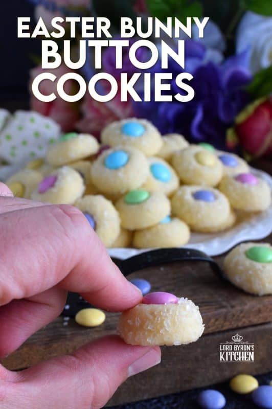 Miniature, one-bite cookies made with pastel candy centers. Easter Bunny Button Cookies are a great Easter gift idea, and can be easily packaged for gift-giving, or just save them all for yourself! Whatever you decide, a double batch just might be a good idea! #easter #bunny #cookies #candy #chocolate