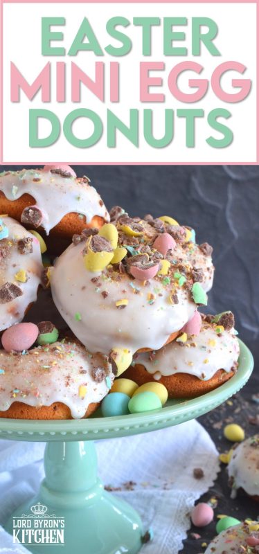 When it comes to donuts, chocolate is always a great choice. Easter Mini Egg Donuts are prepared with a vanilla batter, loaded with crushed Cadbury mini eggs, topped with a simple sugar glaze, and more crushed mini eggs! Easter treats never tasted so good! #donuts #bakeddonuts #doughnuts #easter #cadbury #minieggs