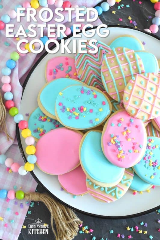 Frosted Easter Egg Cookies are prepared with a light and airy shortbread cookie base consisting of only three ingredients! Once cooled, they are frosted with an easy-to-make royal icing, which hardens and crisps when dried. Topped with sprinkles or simply frosted with whimsical patterns, it's hard to eat only one of these cookies! #easter #easteregg #cookies #royalicing #frosted #sprinkles #cookiecutter