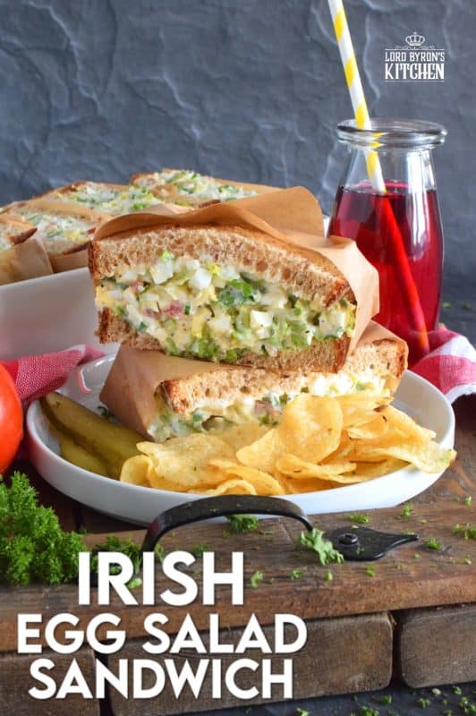 Take this Irish Egg Salad Sandwich to work with you for lunch this St. Patrick's Day! It's the most delicious and interesting egg salad sandwich you'll ever eat! It is super flavourful and filled with freshness too. Get your favourite sandwich bread and overfill it with this egg salad mixture; if it's not messy, you're not doing it right! #eggsalad #sandwich #eggsandwich #irish #stpatricksday #eggsaladsandwich #vegetarian