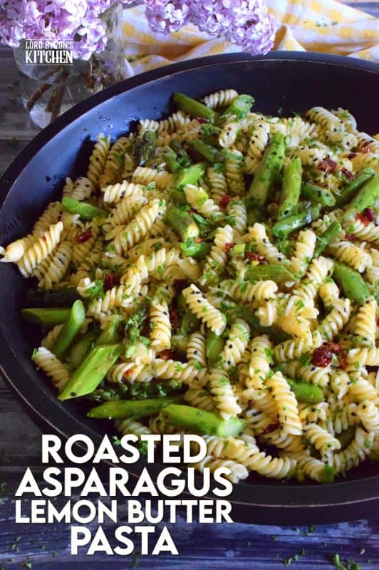 A dish that can only be described as springtime in a bowl, this simple butter roasted asparagus pasta salad, tossed with sun dried tomatoes, fresh lemon, and parmesan. A delightful cold pasta salad that everyone will love! #asparagus #lemon #butter #pasta #salad