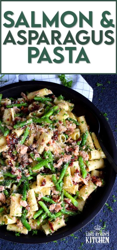 Served warm or hot, Salmon and Asparagus Pasta Salad is a complete meal with so much flavour and texture! The fresh asparagus, lemon juice, and freshly grated parmesan cheese come together to elevate the inexpensive and humble canned flaked salmon! #canned #salmon #asparagus #salad #costco