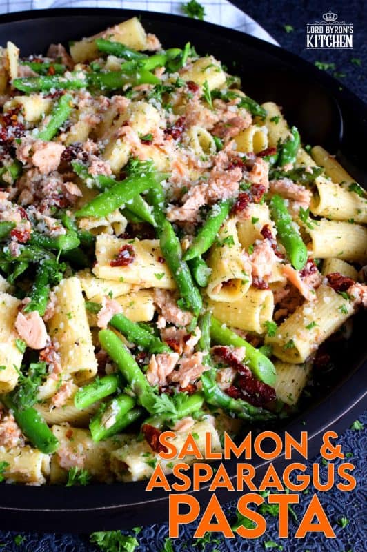 Served warm or hot, Salmon and Asparagus Pasta Salad is a complete meal with so much flavour and texture! The fresh asparagus, lemon juice, and freshly grated parmesan cheese come together to elevate the inexpensive and humble canned flaked salmon! #canned #salmon #asparagus #salad #costco