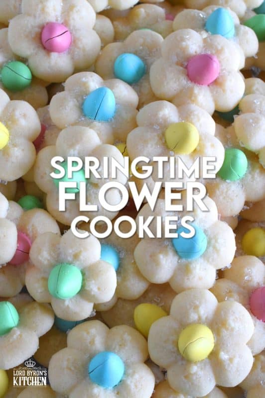 A good spritz cookie should taste slightly sweet and buttery. The cookie should be slightly crumbly, but not dry, and it should feel like it’s melting in your mouth. Topped with a single candy-coated chocolate, these Springtime Flower Cookies are not only delicious but pretty and cheerful too! #spritz #cookies #easter #spring #flower #cadbury #minieggs