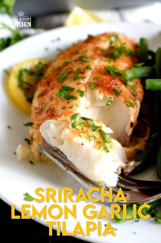 Classic fish recipe ingredients like lemon and garlic come together with the help of sriracha to create a baked tilapia worthy of the highest praise. Boring fish recipes be gone; say hello to Sriracha Lemon Garlic Tilapia! #tilapia #lemongarlic #bakedfish #bakedtilapia