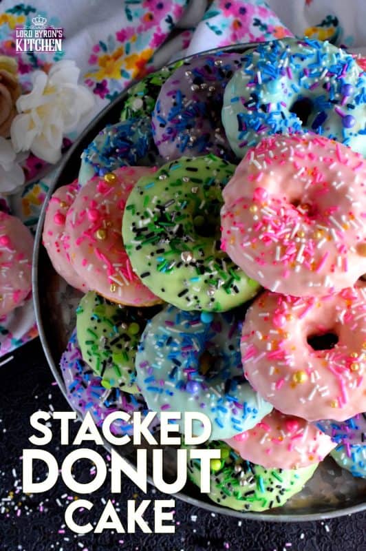 Who doesn't get excited when they see a big pile of donuts? Sure, you could go to your favourite pastry shop, but you can easily make your own donuts at home. This Stacked Donut Cake is proof of that! And, it's perfect for any occasion! #donuts #homemade #stackedcake #donutcake