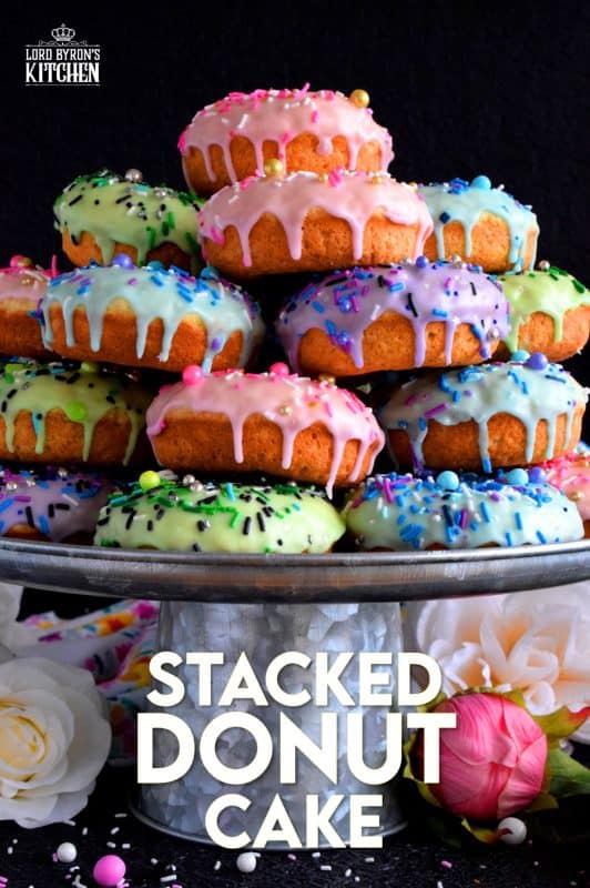 Who doesn't get excited when they see a big pile of donuts? Sure, you could go to your favourite pastry shop, but you can easily make your own donuts at home. This Stacked Donut Cake is proof of that! And, it's perfect for any occasion! #donuts #homemade #stackedcake #donutcake