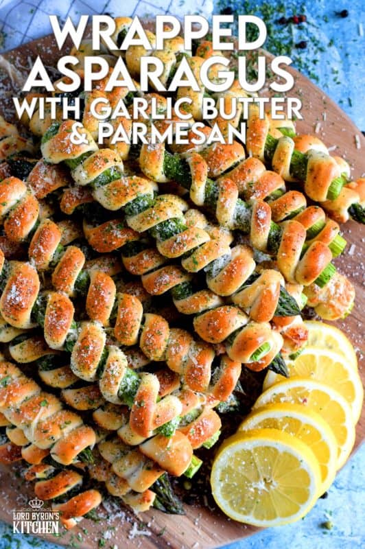 Whether you're looking for a new side dish or an interesting appetizer, Wrapped Asparagus with Garlic Butter and Parmesan is the answer. Perfectly baked, perfectly seasoned, and perfectly perfect! Serve hot or at room temperature! #asparagus #wrapped #appetizer #homemade #dough #biscuit #dip #baked #roasted