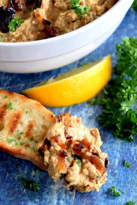 Of all the varieties of hummus, Caramelized Onion Hummus is my favourite.  It works great with veggies, but also as a spread with grilled crostini, crackers, or rice cakes.  This hummus is completely versatile because it's both savoury and sweet at the same time! #hummus #caramelized #onion #homemade #dip