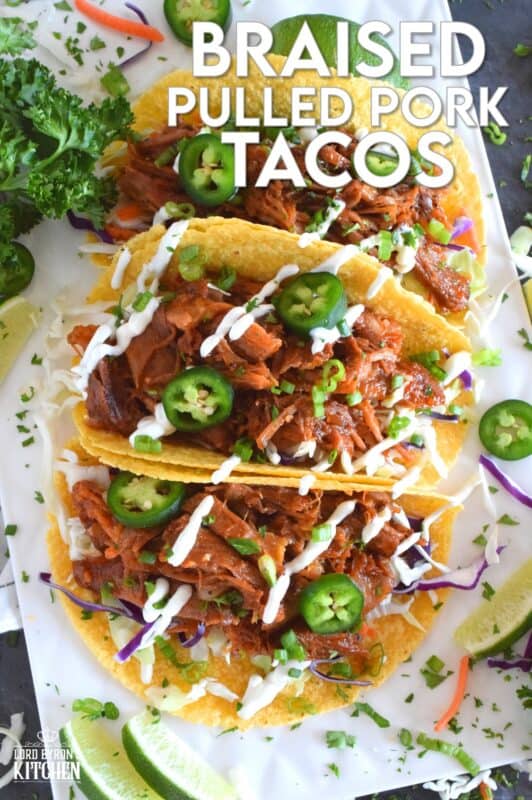 Moist and tender pork shoulder roast is braised in a rich and sweet tomato-based sauce with white wine, and brown sugar. The secret to these absolutely delicious Braised Pulled Pork Tacos is allowing the meat to cook slowly over low heat in a covered pan for multiple hours. Braising cannot be rushed and patience is greatly rewarded with just one bite of this deliciously savoury taco! #tacos #pulledpork #stovetop #castironcooking #dutchoven #porkshoulder #pork