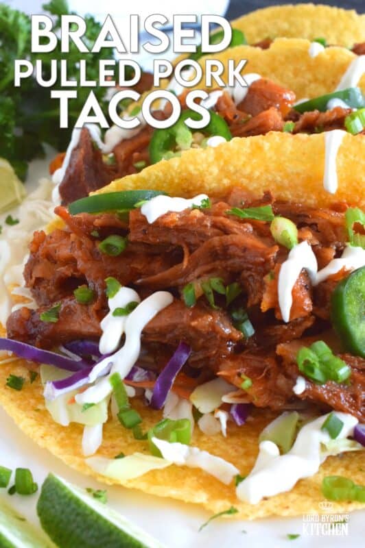 Moist and tender pork shoulder roast is braised in a rich and sweet tomato-based sauce with white wine, and brown sugar. The secret to these absolutely delicious Braised Pulled Pork Tacos is allowing the meat to cook slowly over low heat in a covered pan for multiple hours. Braising cannot be rushed and patience is greatly rewarded with just one bite of this deliciously savoury taco! #tacos #pulledpork #stovetop #castironcooking #dutchoven #porkshoulder #pork