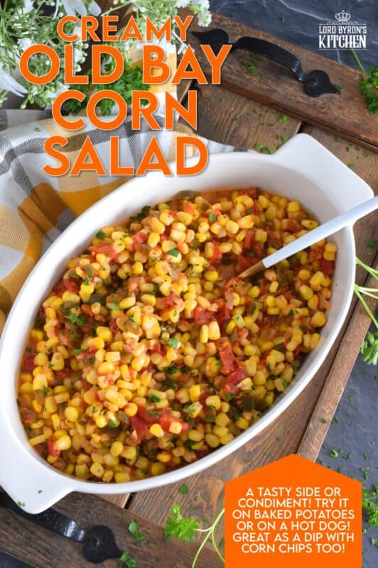 This warm and creamy corn salad is prepared with old bay seasoning, fried onions, bell peppers, garlic, and tomatoes. It's a perfect side dish for a backyard barbecue or a weeknight cold weather dinner. Serve with your favourite mains or spoon it onto grilled burgers and hot dogs. This side is versatile and delicious! #salad #corn #oldbay #creamedcorn #sidedish #vegetarian