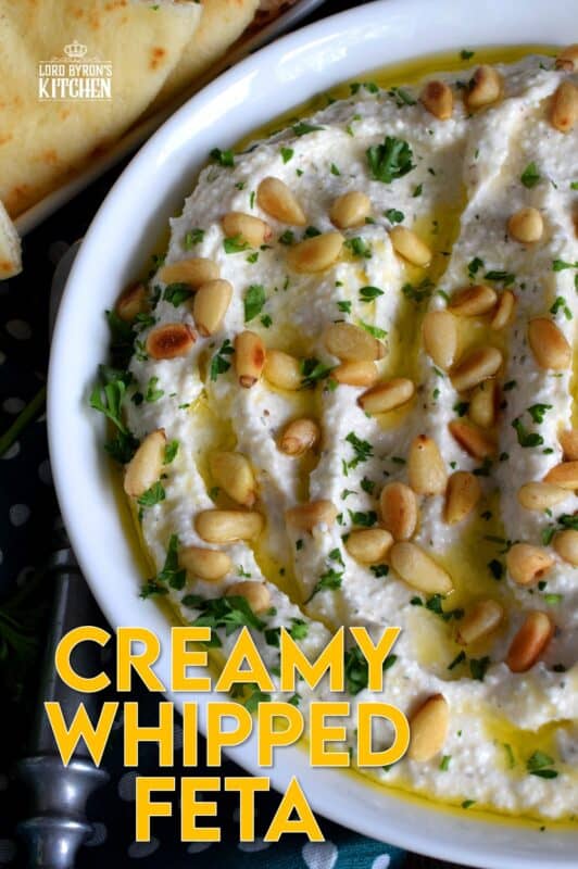 Salty and velvety smooth, seasoned with pantry herbs and spices, Creamy Whipped Feta will satisfy all of your snack cravings. Smear it on crackers and bread, or use it as a dip with veggies or pita. For even more flavour, be sure to toast the pine nuts first! #feta #fetadip #whippedfeta #dip #spread #appetizer