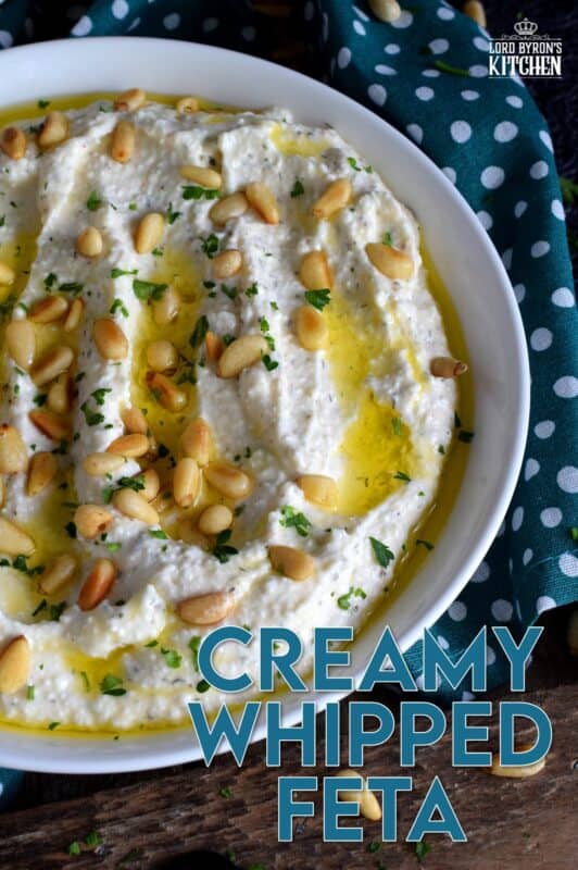 Salty and velvety smooth, seasoned with pantry herbs and spices, Creamy Whipped Feta will satisfy all of your snack cravings. Smear it on crackers and bread, or use it as a dip with veggies or pita. For even more flavour, be sure to toast the pine nuts first! #feta #fetadip #whippedfeta #dip #spread #appetizer