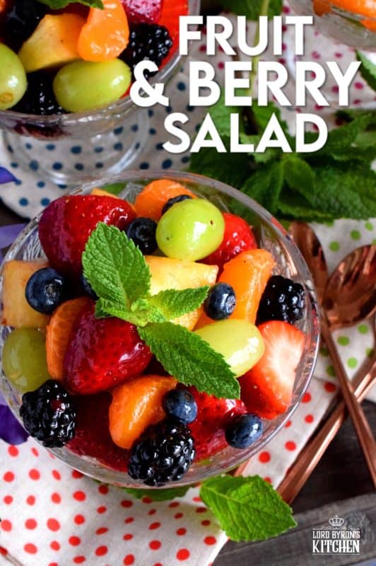 Fruit and Berry Salad is always best when comprised of fruit and berries that are currently in season, but there are certainly no die-hard rules; after all, rules were made to be broken! Use a sugar-free jelly to give your fruit that glossy, shiny look!! #fruitsalad #fruitbowl #choppedfruit #glazedfruitsalad #summerfruit #berries #fruitsandberries